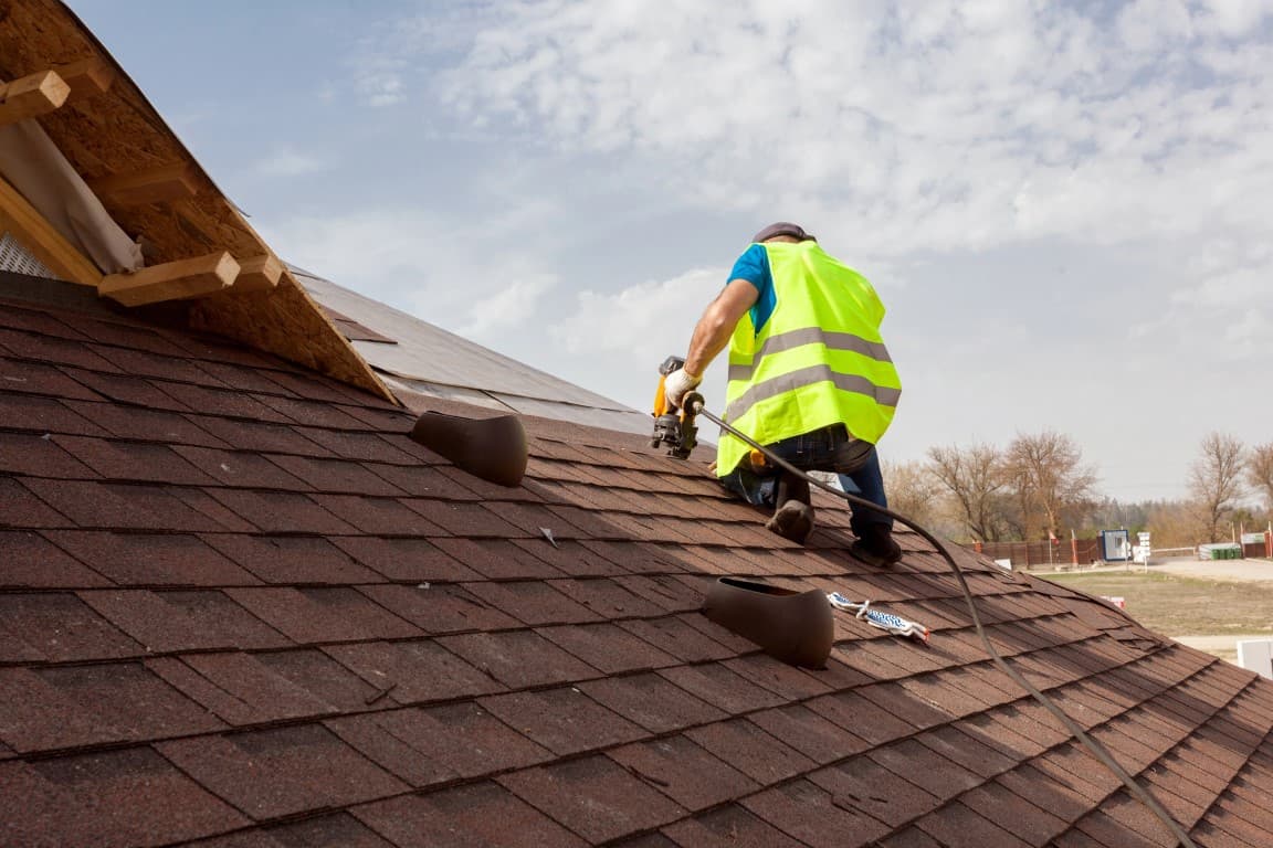 An image showing emergency roof repair services in action.